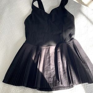 Black lululemon pleated top with back cut out!
